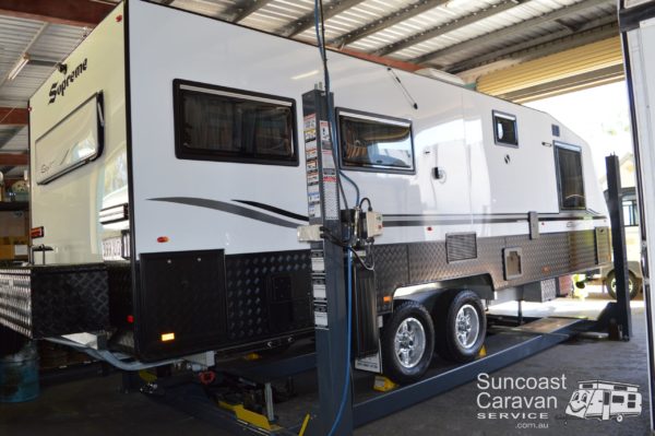 caravan on hoist for safety & gas certification