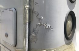 damage to fibreglass back corner of caravan